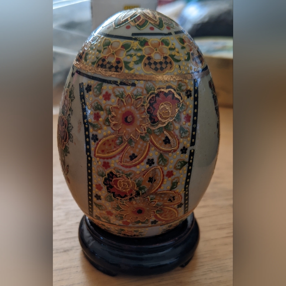 Beautiful Porcelain Floral Decorative Egg with Stand.